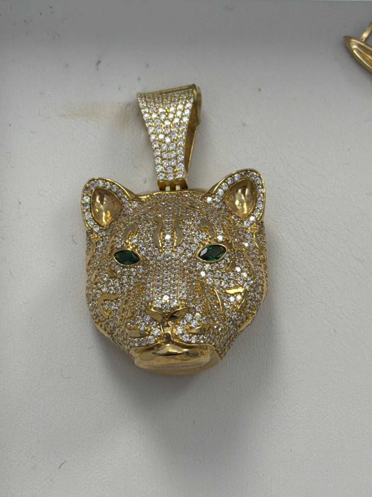 14k tiger pendant with stones