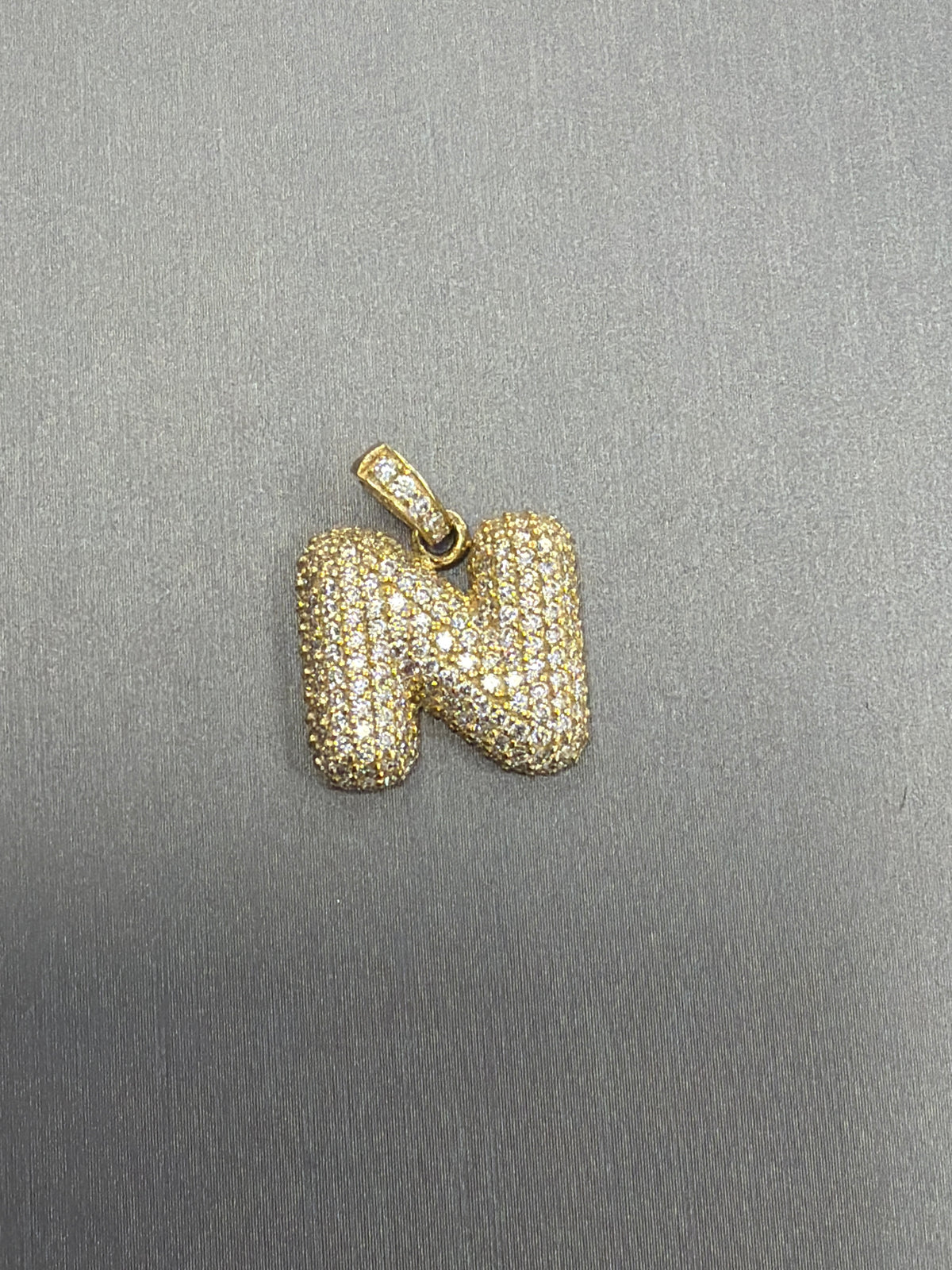 14k letter N pendant with Cz’s stones