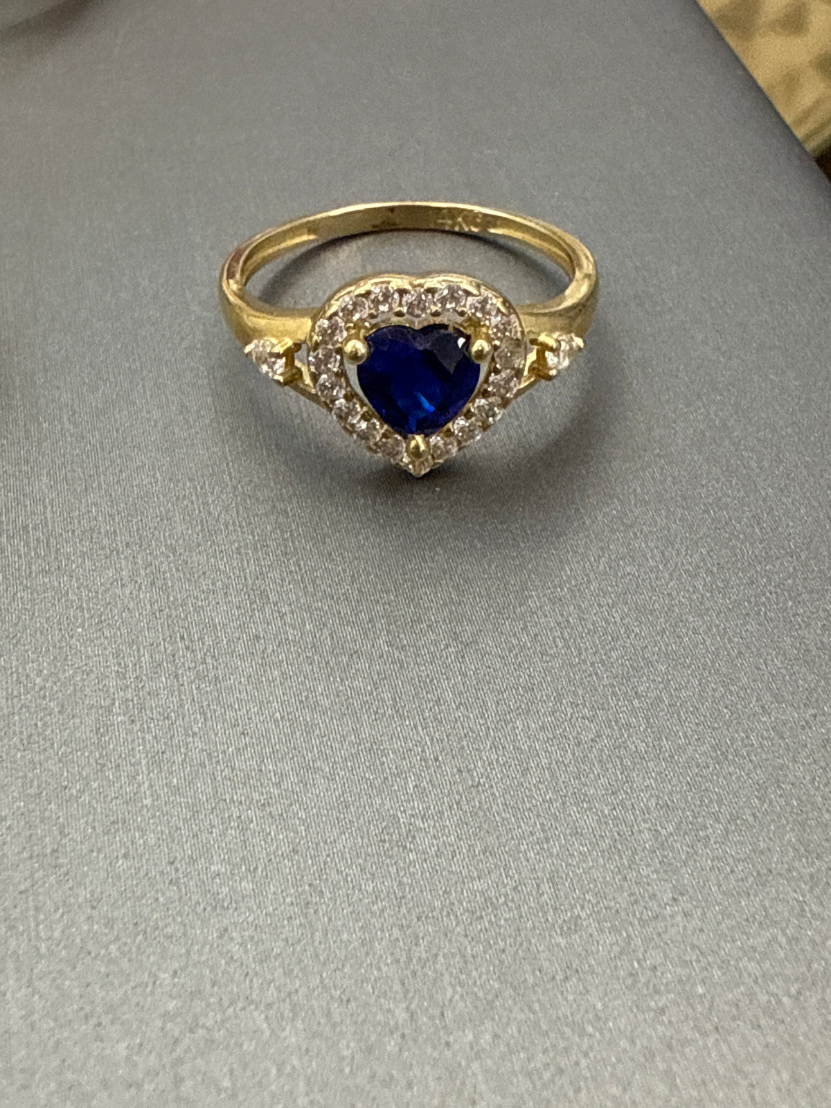 14k heart ring with big light blue stone