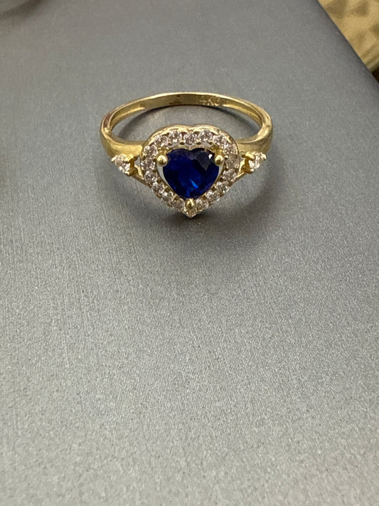14k heart ring with big light blue stone