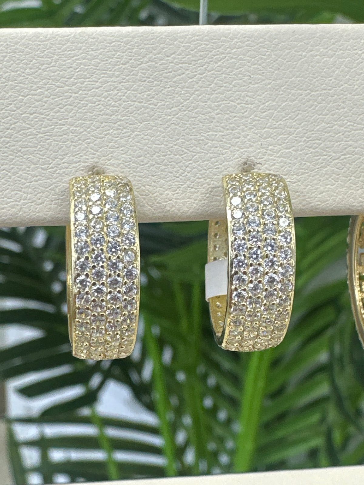 10k hoops small Huggies design stones all around