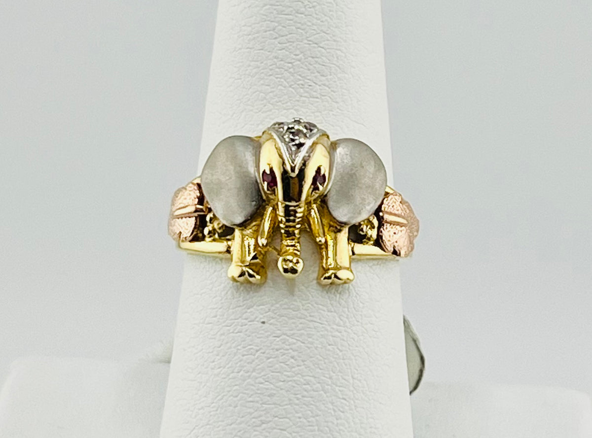 14k tri-colored elephant ring with red and white stones