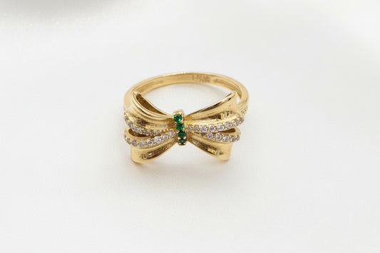 14k ring bow with green stones