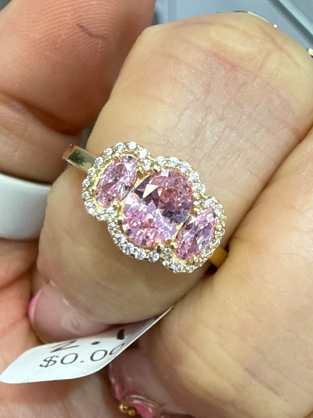 14k 3 pink stone ring with 3 stones and halo