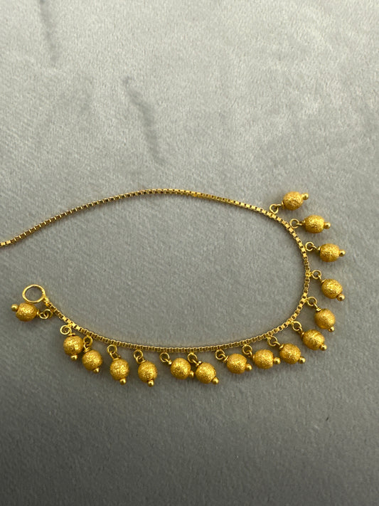 22k  gold charm bracelet