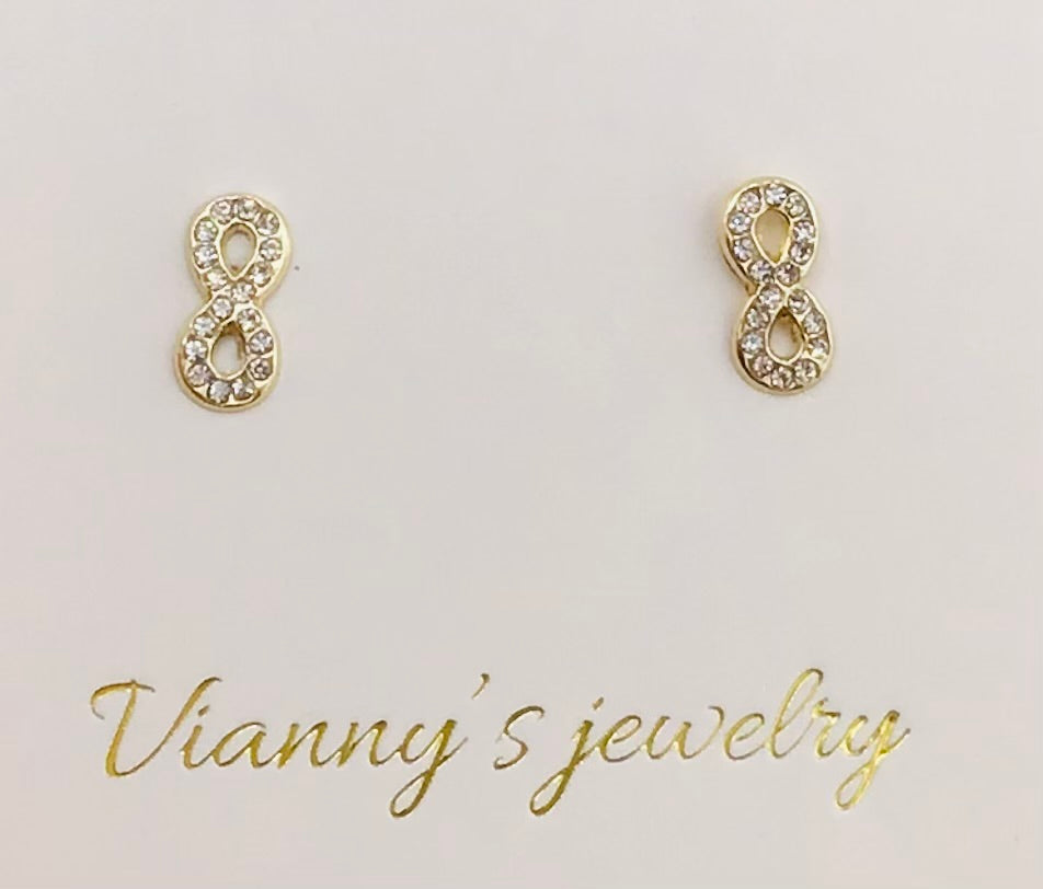 Baby earing infinity with stones