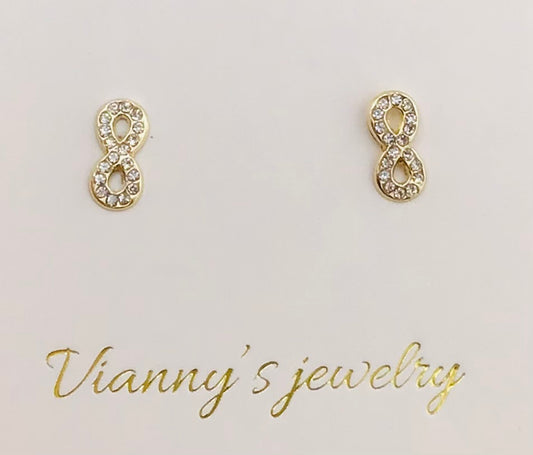 Baby earing infinity with stones