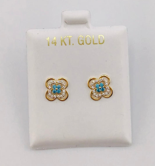 Baby earing blue and white