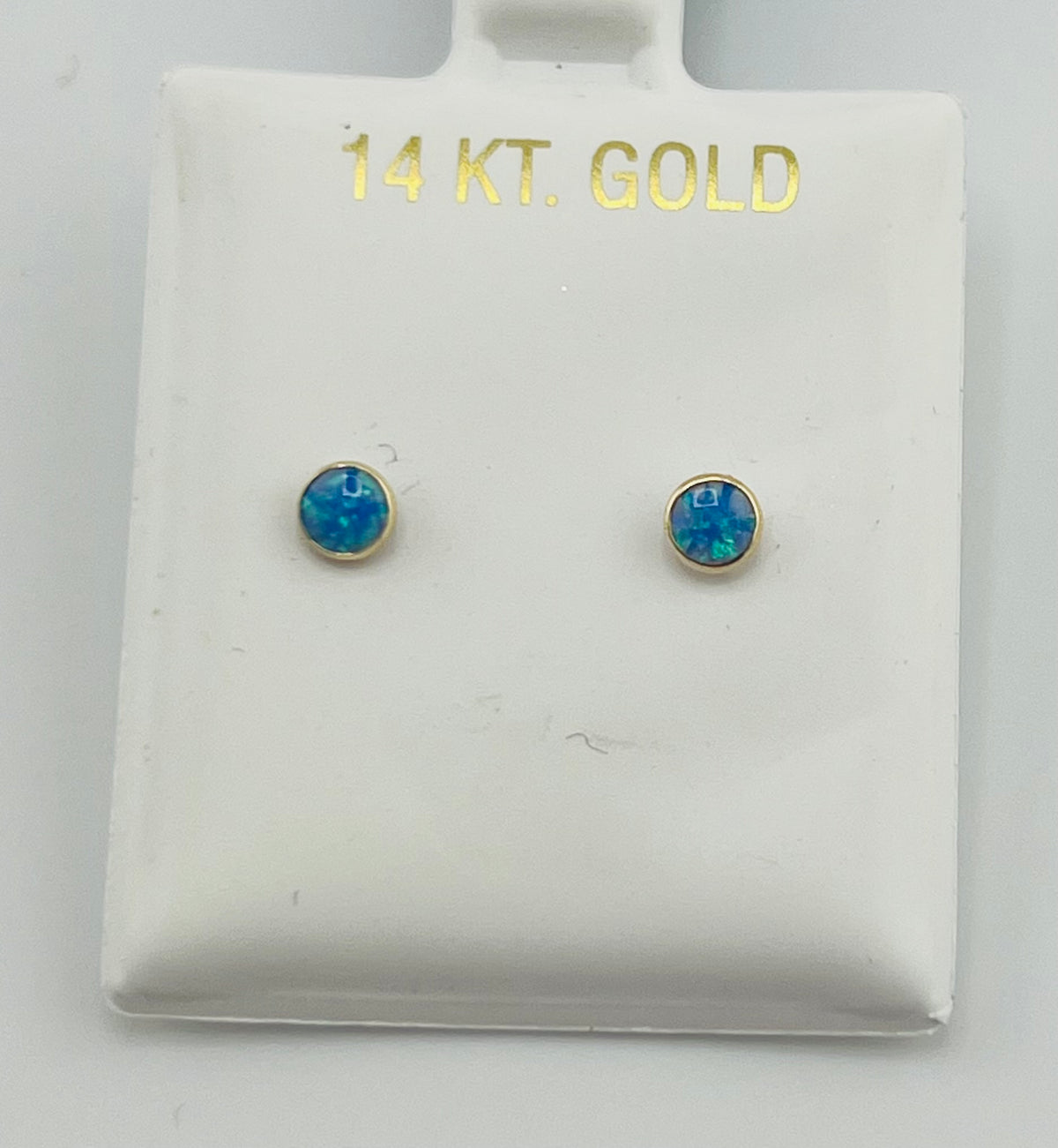 Baby earing blue circle