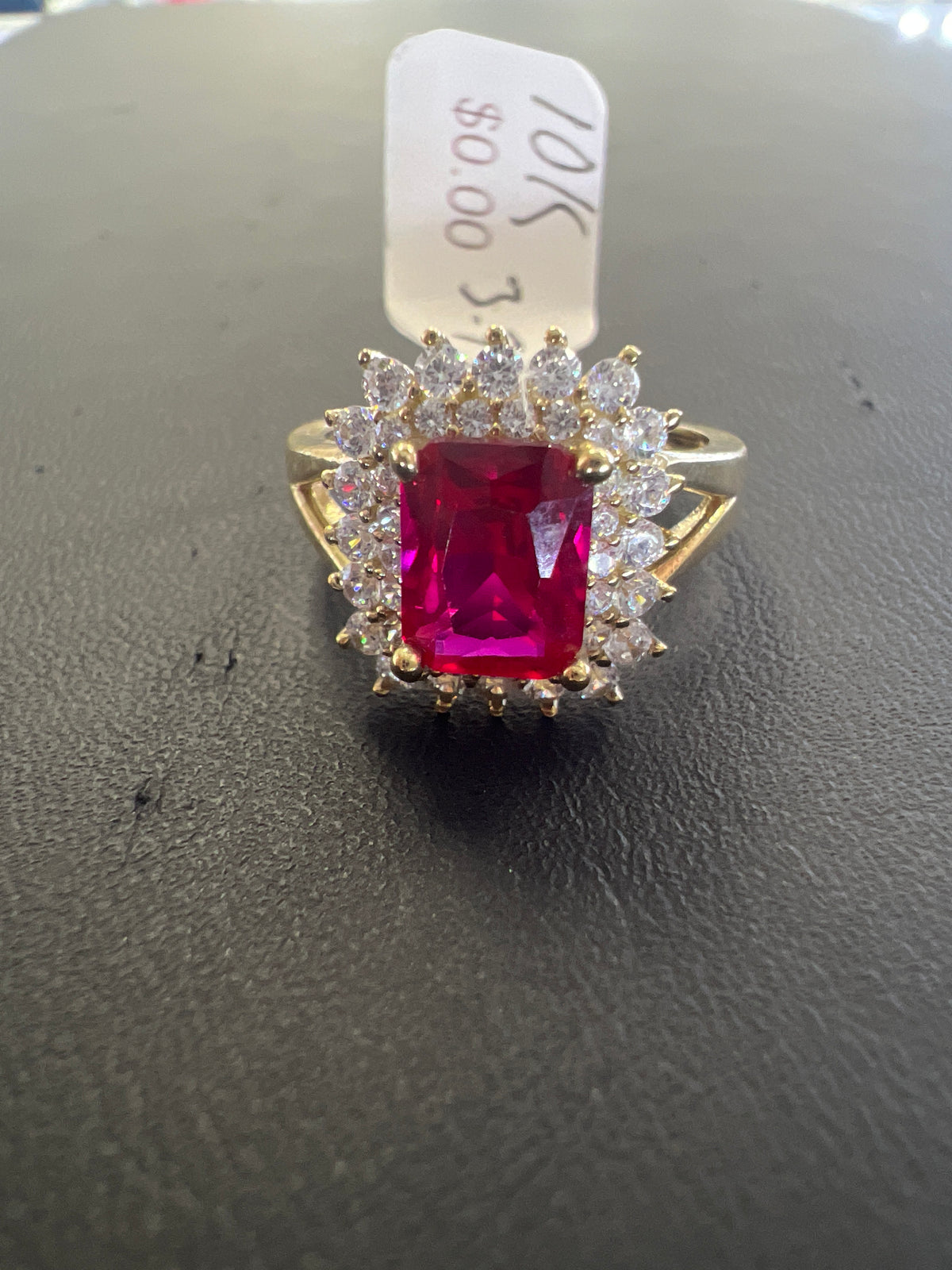 10k ring  red stone with hallo stones