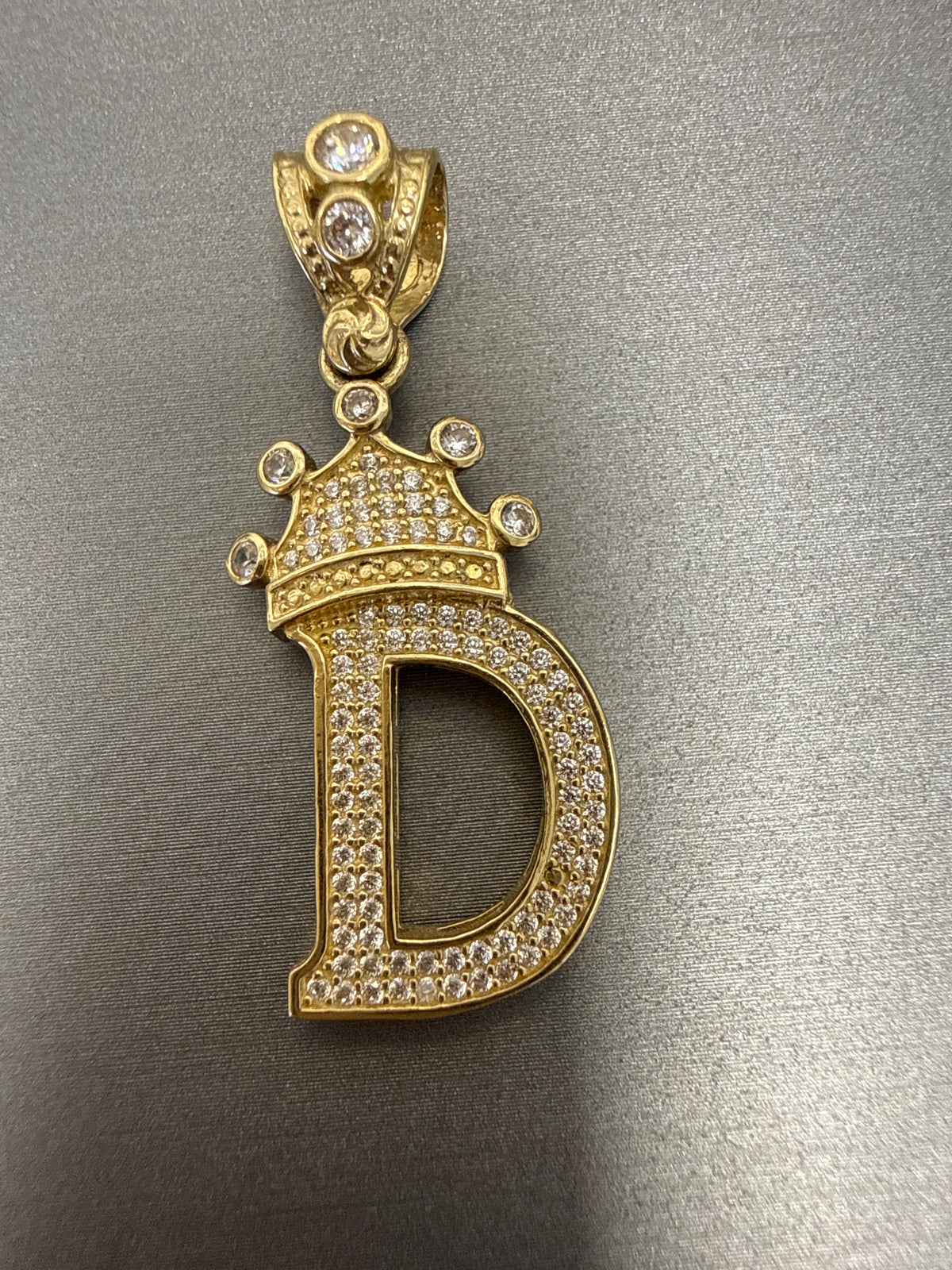 14k letter D pendant with crown on Cz’s stones