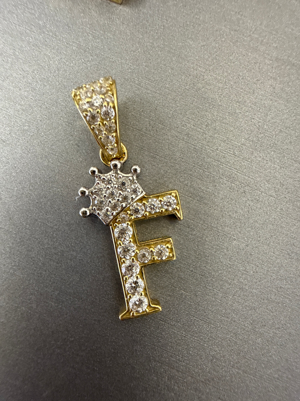 14k letter F pendant with crown on Cz’s stones