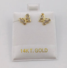 Baby earing butterfly with stones
