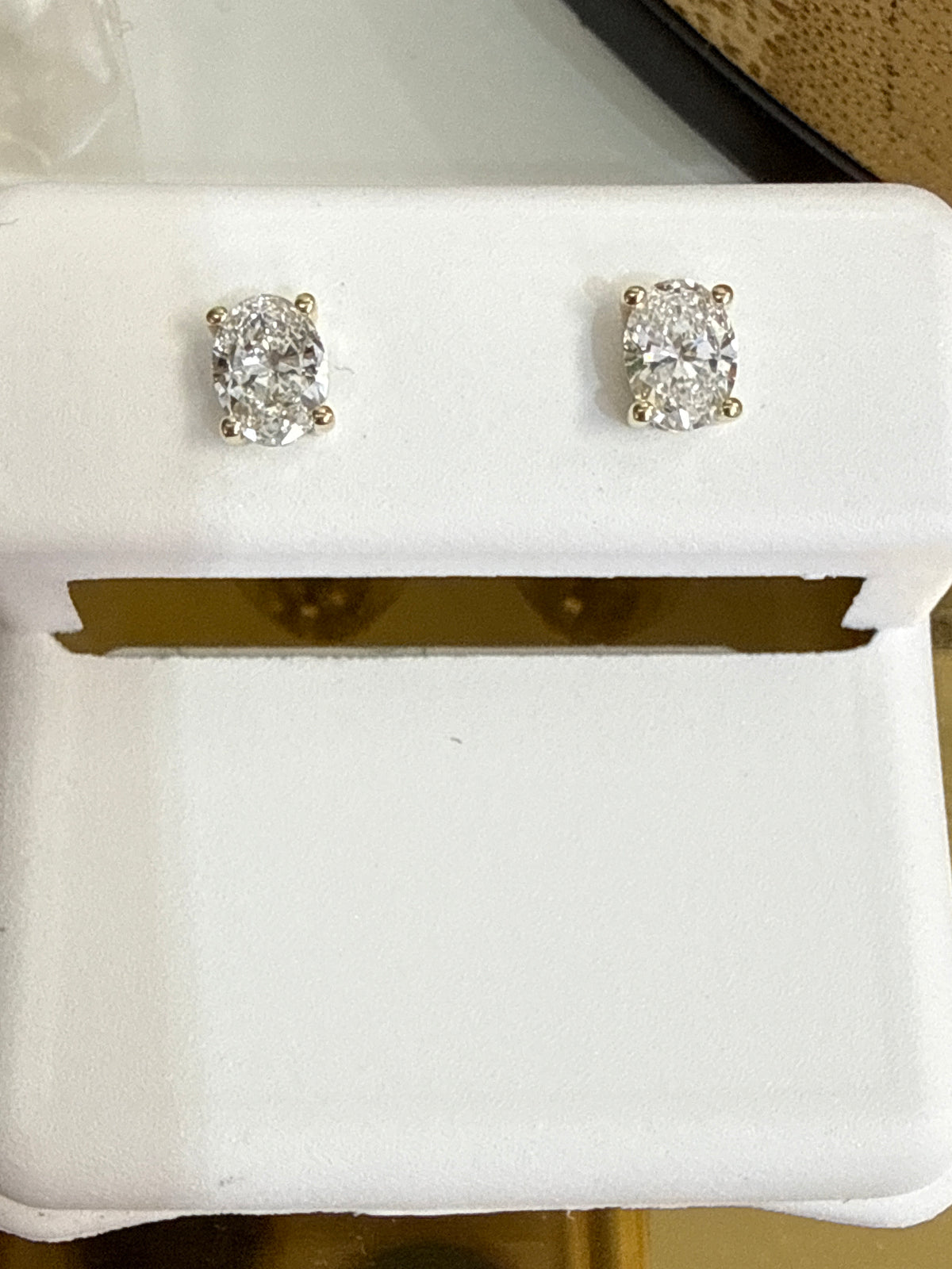 14k diamond earing oval shape yellow gold 0.49ct