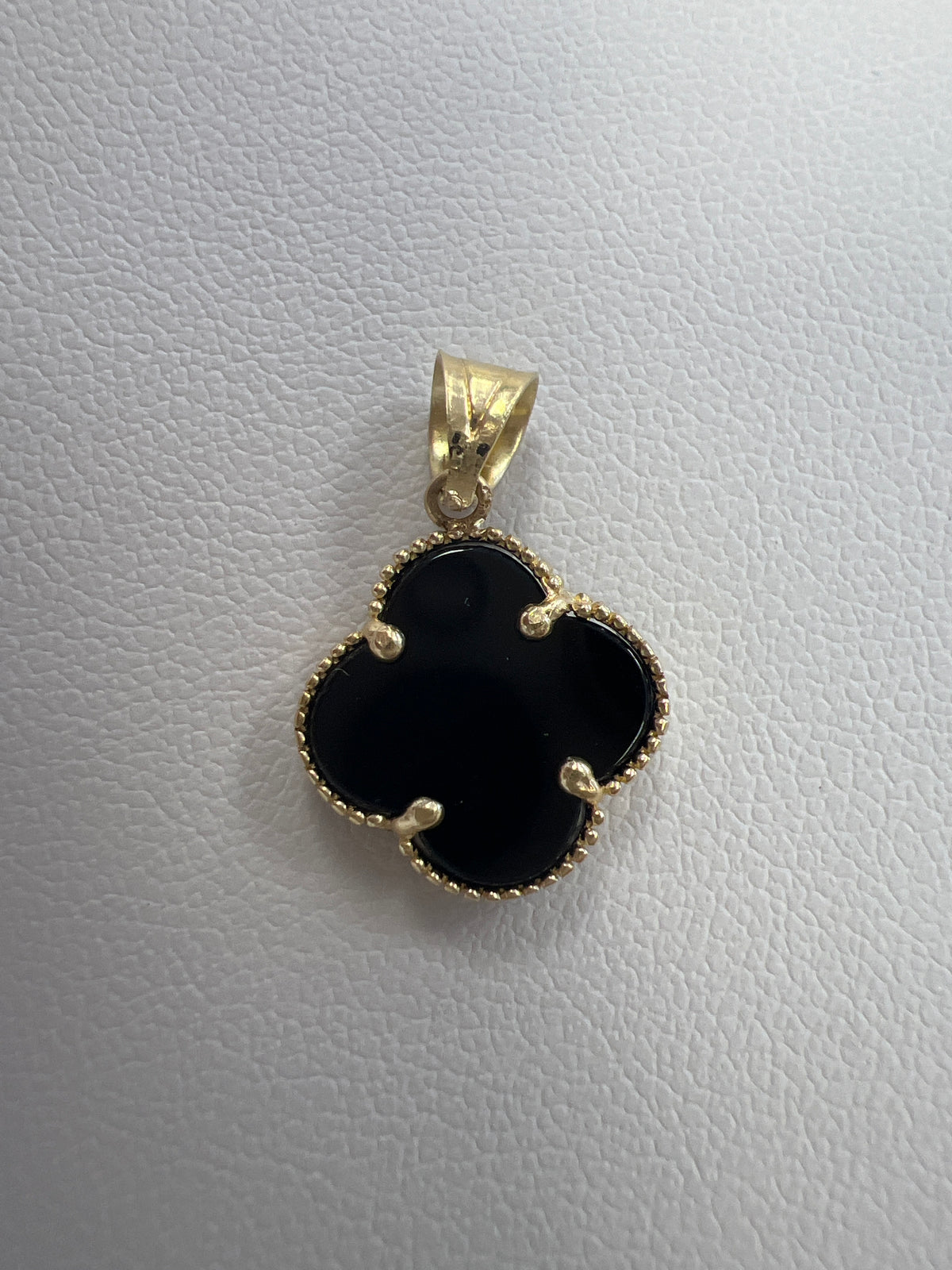 14k black and gold clover pendant