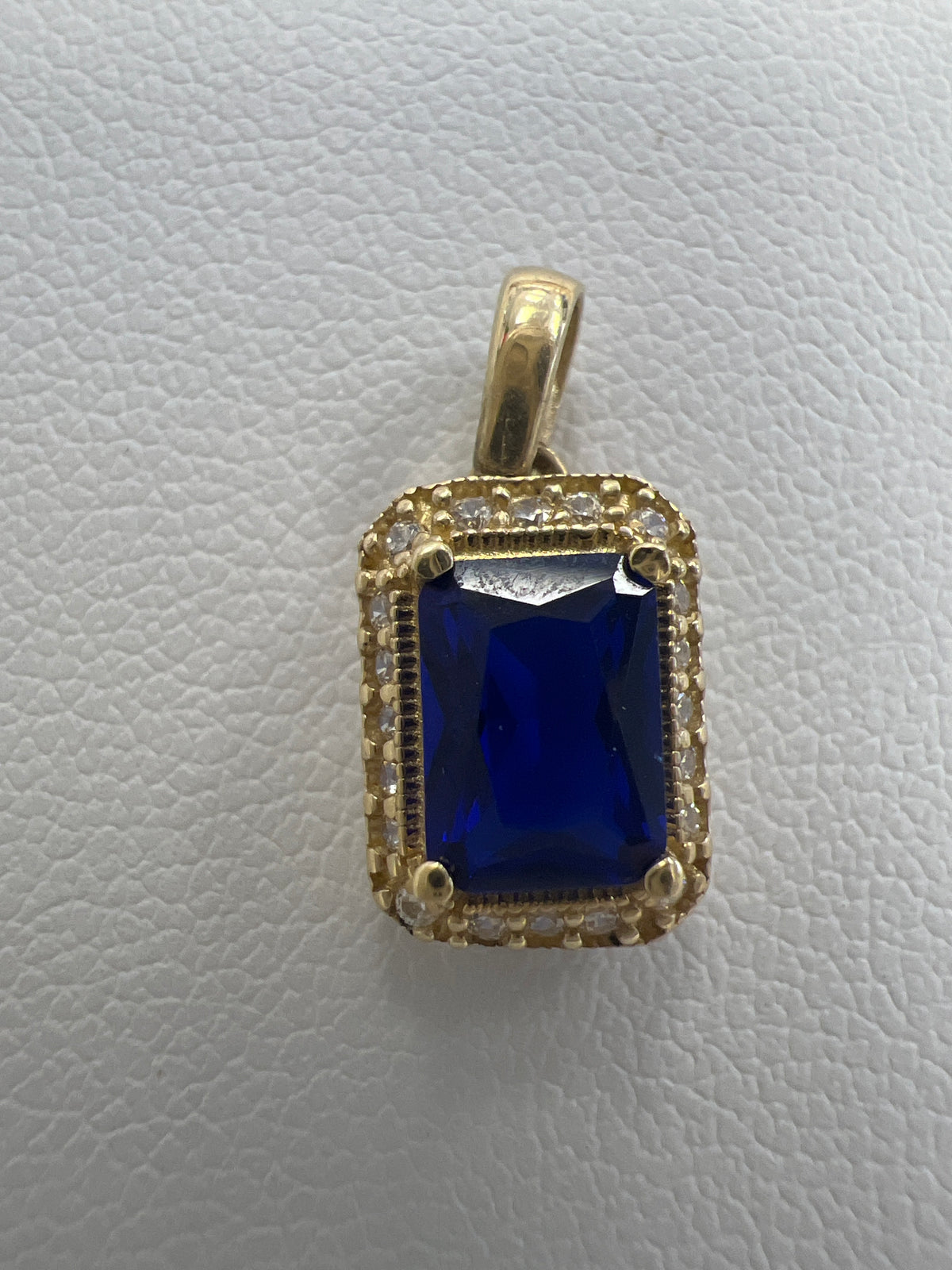 14k rectangle blue stone pendant with white stones