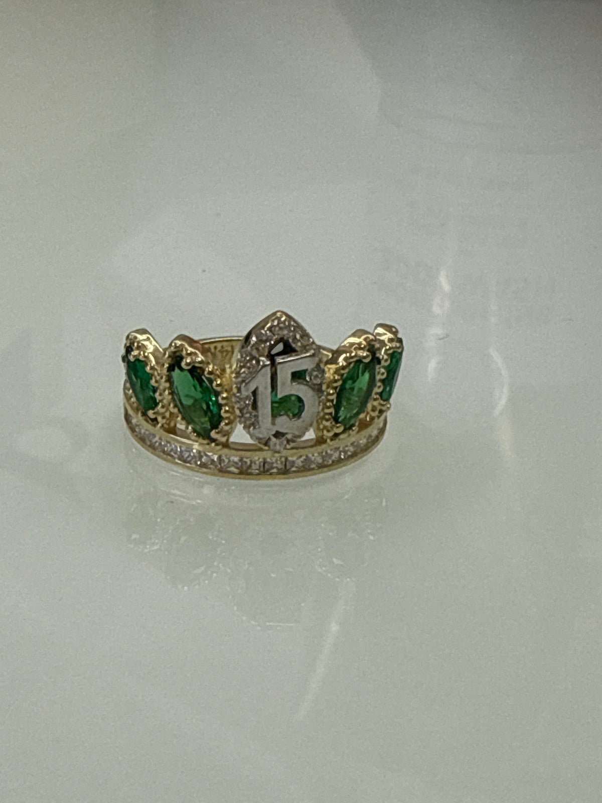 14k Quince (15) crown with stones many colors