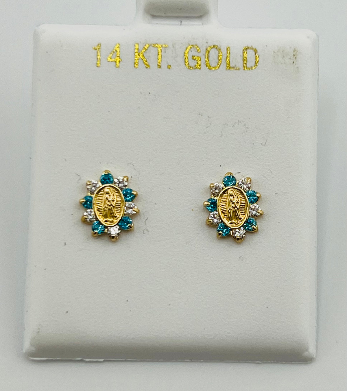 Baby earing virgen mary