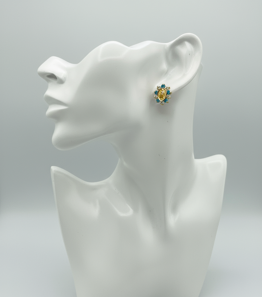 Baby earing virgen mary