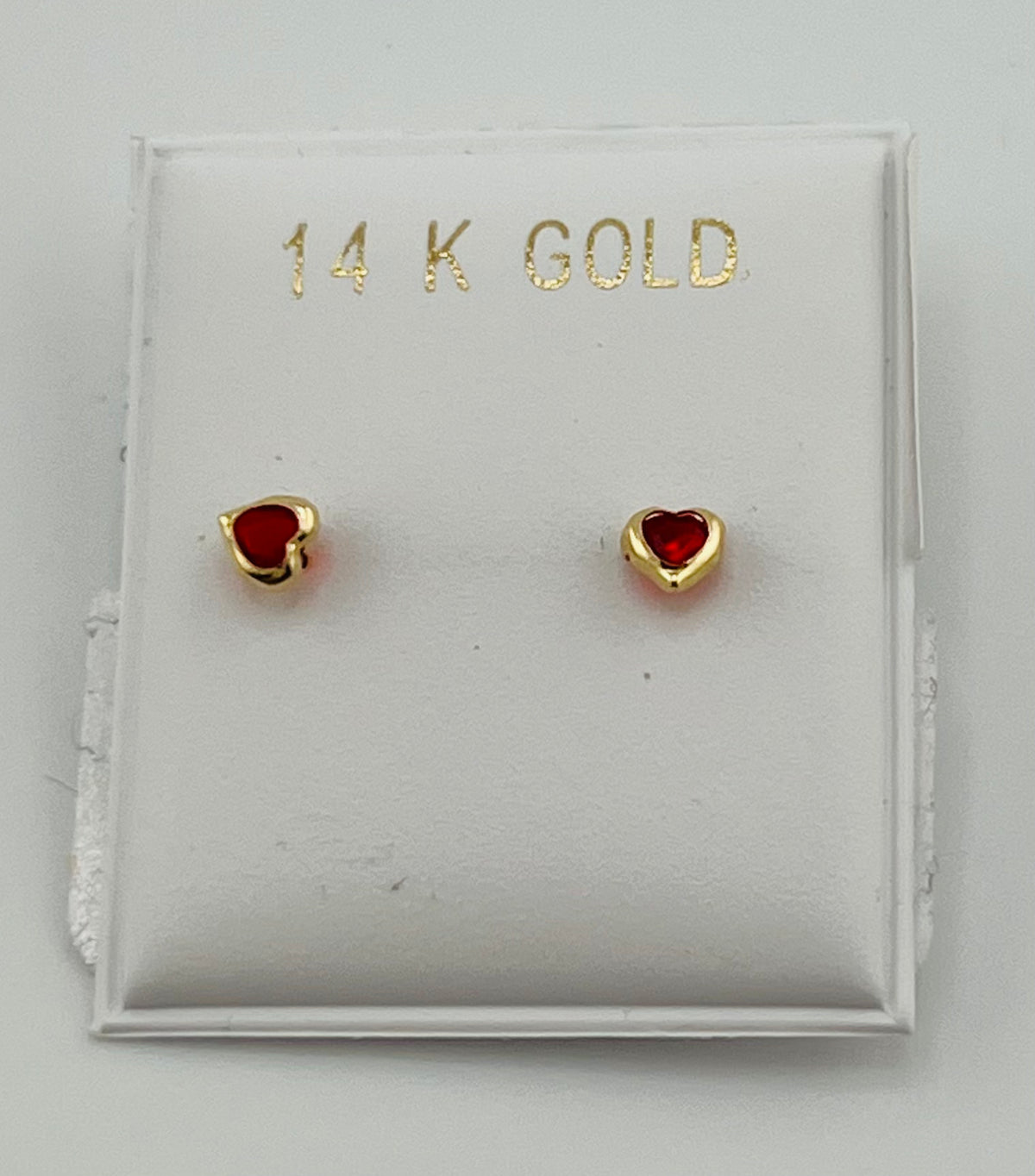 Baby earing heart shape