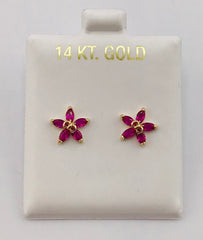 Baby earing red flower