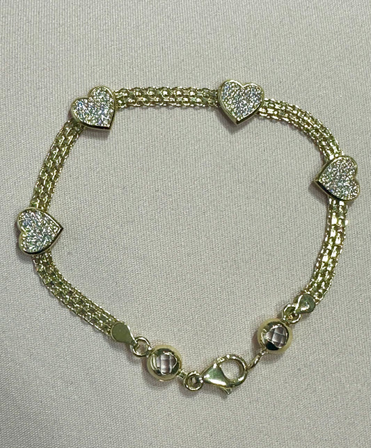 14k heart bracelet with stones 7”