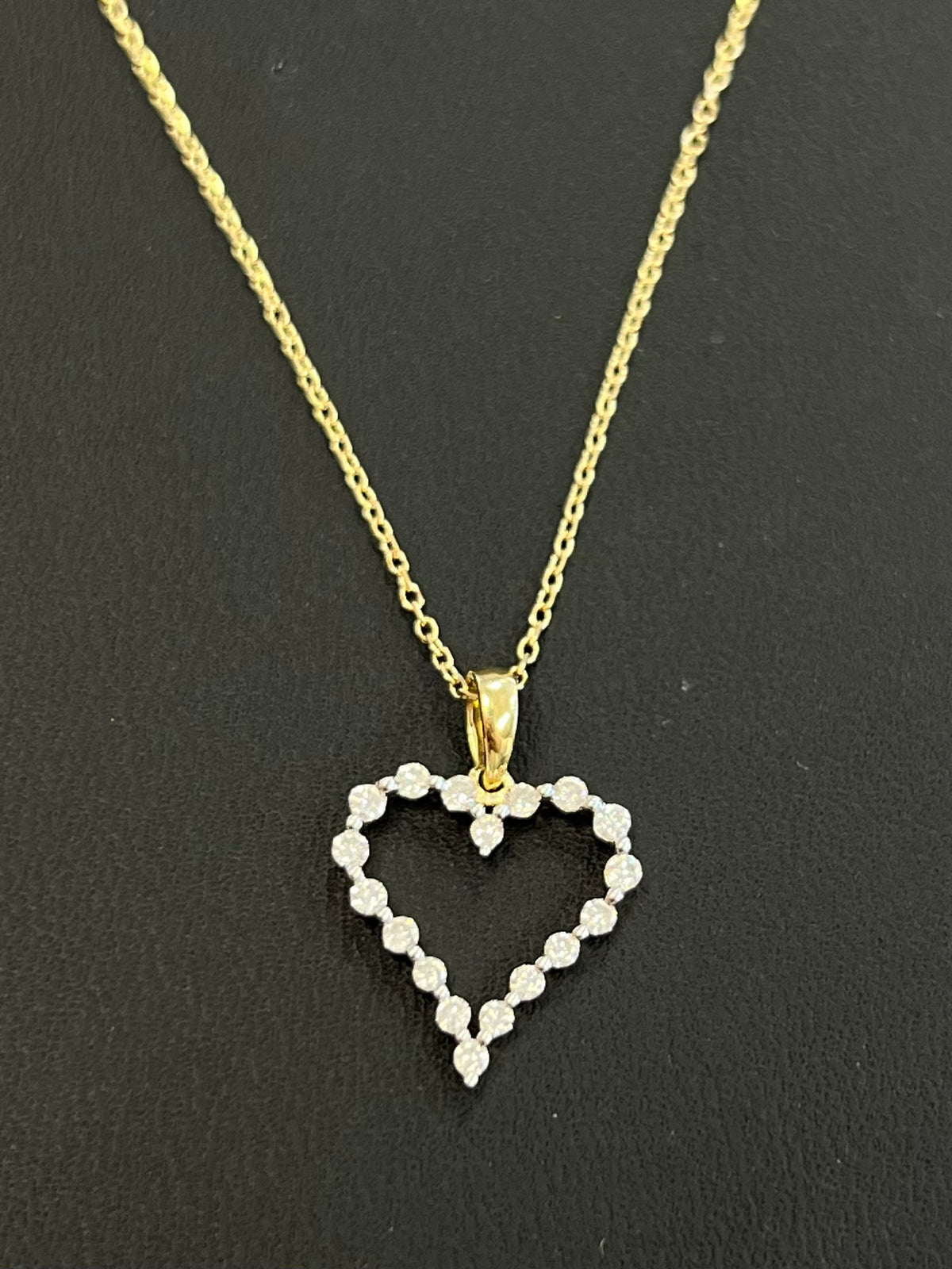 14kt gold heart necklace with .25ct diamond