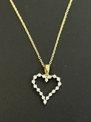 14kt gold heart necklace with .25ct diamond