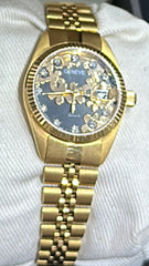 21k solid gold watch