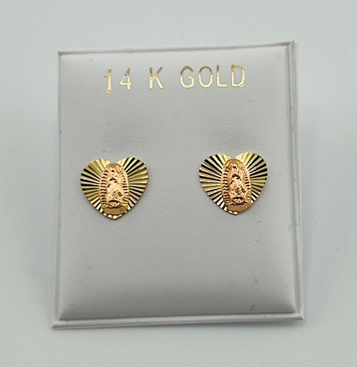 Baby earing virgen heart shape