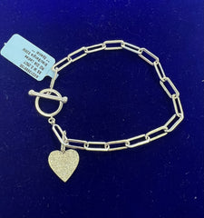 Silver bracelet with heart charm and diamonds .25ct