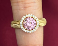 14k pink circle stone ring with smaller stones
