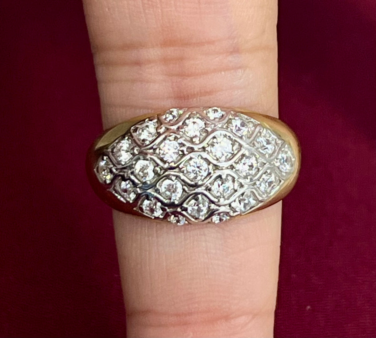 14k ring with many smaller stones