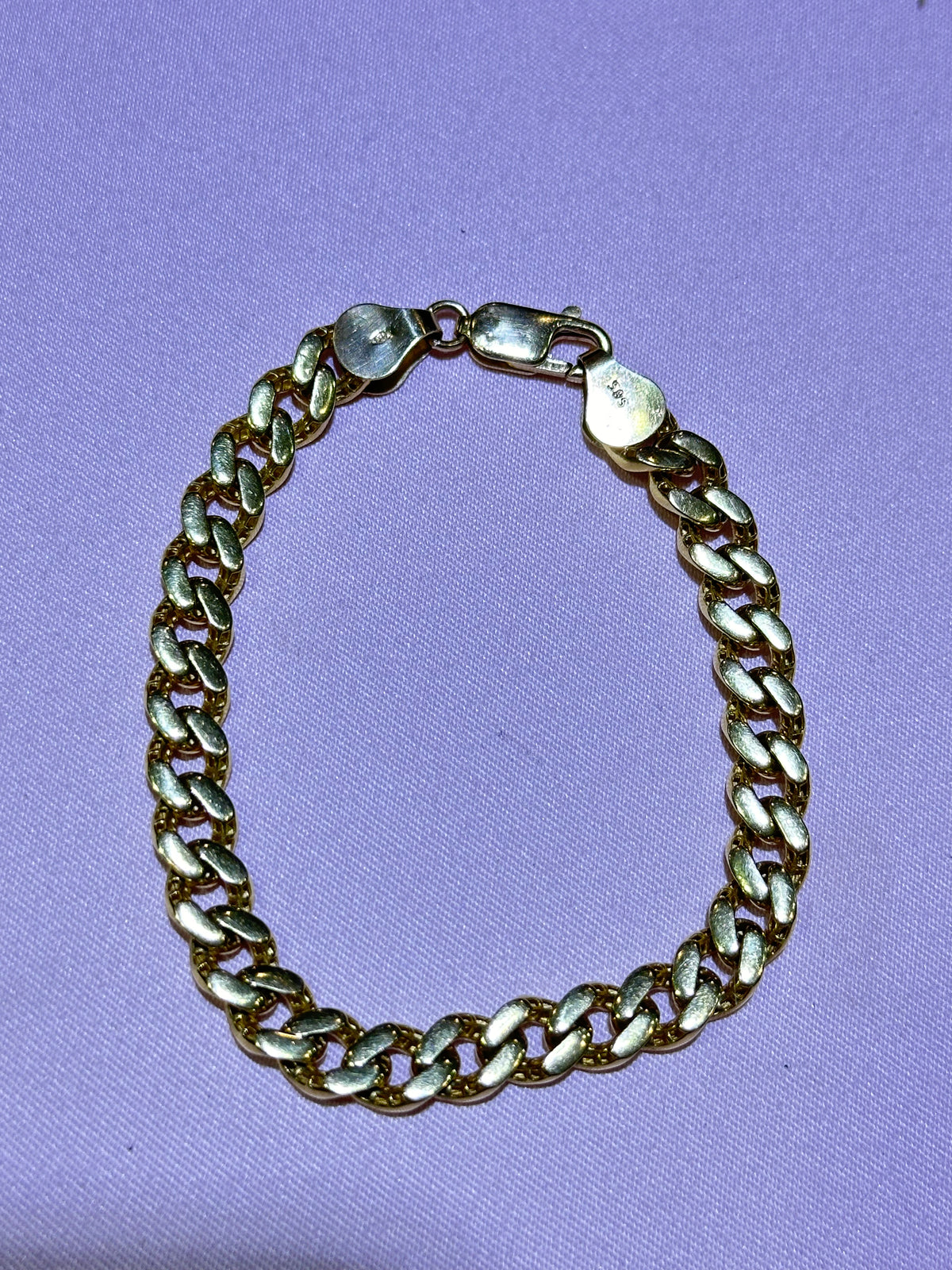 14k cuban link bracelet 7”